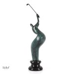 Statue en bronze représentant un joueur de golf