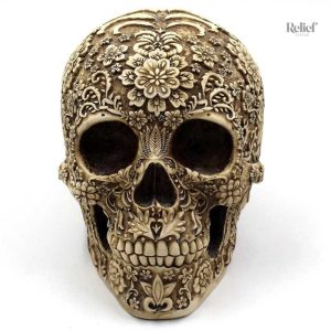 Calavera en céramique colorée à motifs traditionnels