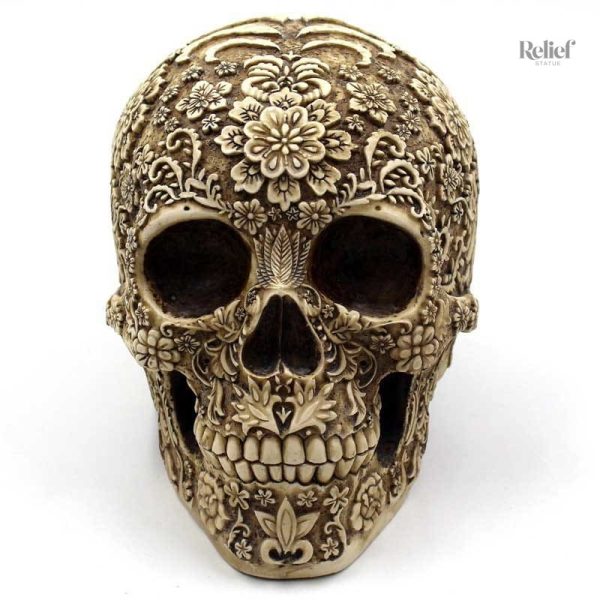 Calavera en céramique colorée à motifs traditionnels