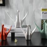 Art de la sculpture origami avec une élégante statue de cygne