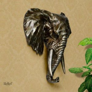 Éléphant mural en relief pour ambiance chaleureuse