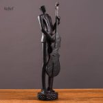 Figurine représentant un musicien, artisanat soigné