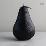 Sculpture en résine représentant des fruits modernes