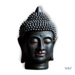 Sculpture moderne tête de Bouddha en méditation