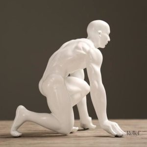 Représentation en statue d'un homme athlète, expressif et élégant