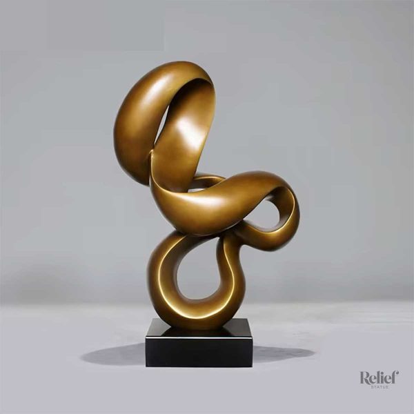 sculpture-abstraite-geometrique-minimaliste-doree-59-cm-1 Sculpture géométrique dorée minimaliste 59 cm