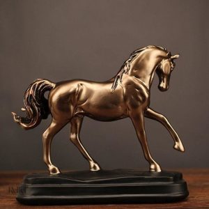 Sculpture dorée effet bronze, 20 cm de hauteur