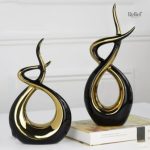 Sculpture contemporaine : or et abstraction