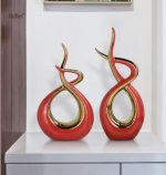 Statue d'art moderne en or brillante
