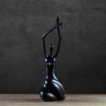 Art déco : statue femme nue, ronde et assise