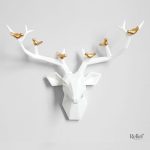 Tête de cerf sculptée, design mural élégant