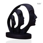 Statue abstraite d'homme avec trio de visages artistiques