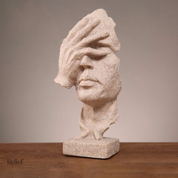 Visage stylisé en sculpture, décoration contemporaine homme