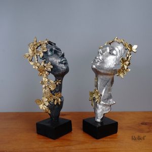 Visage femme sculpté, décoration intérieure élégante