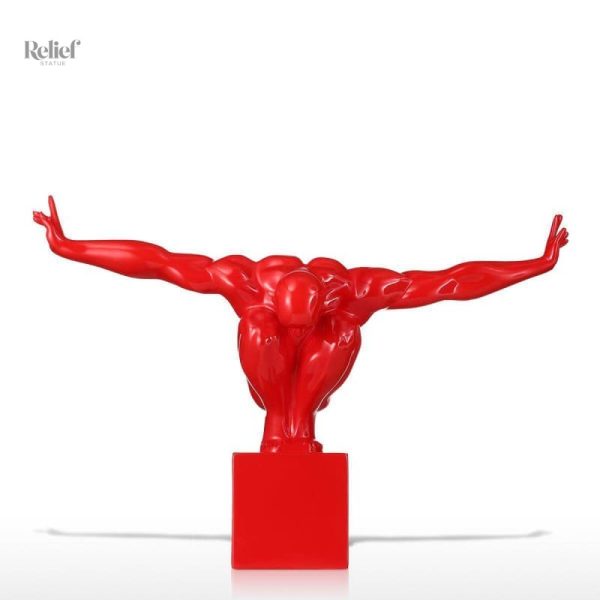 Statuette homme nu dans une pose sportive