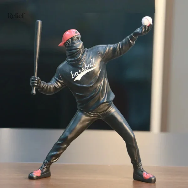 Sculpture artistique représentant un joueur de baseball