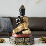 Bouddha Amitabha en finition noire et dorée, 23 cm