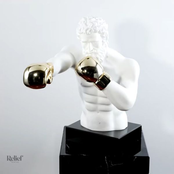 Art grec : statue de boxeur avec gants dorés