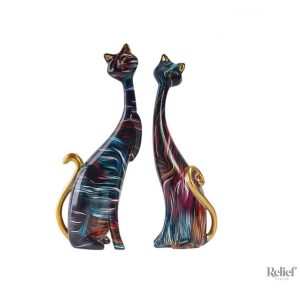 Statue de couple de chats avec feu d'artifice