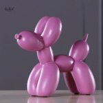 Authentique statue de chien avec un joli ballon