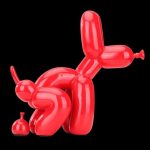 Artisanat de résine représentant un chien et un ballon