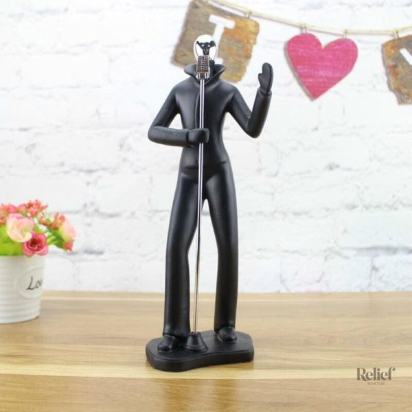 Statue artistique d'hommes jouant de la musique