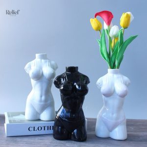 Art décoratif : buste de femme, statue d'Ève