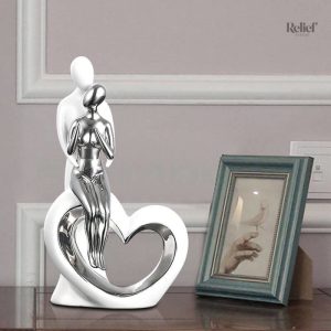 Statue de couple avec style vintage, décoration unique