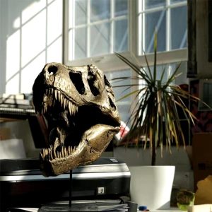 Tête de Tyrannosaure en statue, design crâne de dinosaure