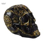 Statue de crâne noir avec accents dorés, 12 cm
