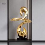 Statue design abstraite dorée en résine, 49 cm