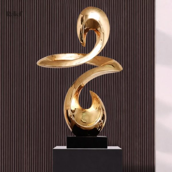 Sculpture décorative moderne en résine dorée