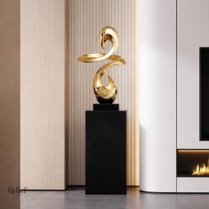 Sculpture design en résine, finition dorée