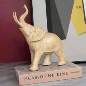 Éléphant en résine finition bois clair 26 cm, décoration intérieure