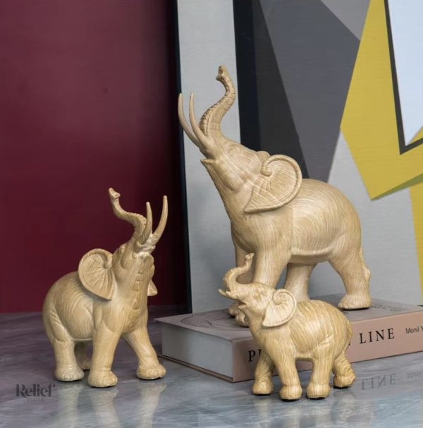 Figurine éléphant en résine, aspect bois chêne clair