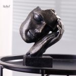 Figurine femme visage style bronze 22 cm