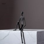 Décoration en métal, statue homme assis