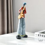 Art décoratif, sculpture homme musicien