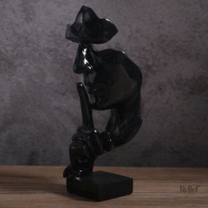 Statue d'homme symbolisant le silence