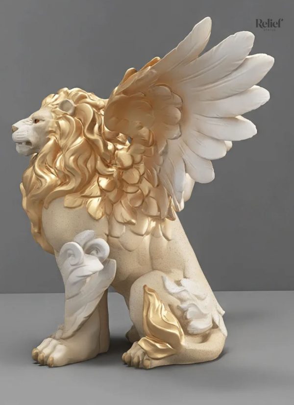 Ornement blanc et doré de lion ailé