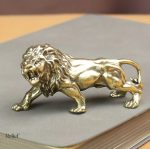 Statue lion en métal 4 cm, design élégant et contemporain