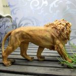 Lion sculpté 24 cm, symbole de force et de courage