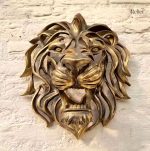 Décoration murale tête de lion en métal doré