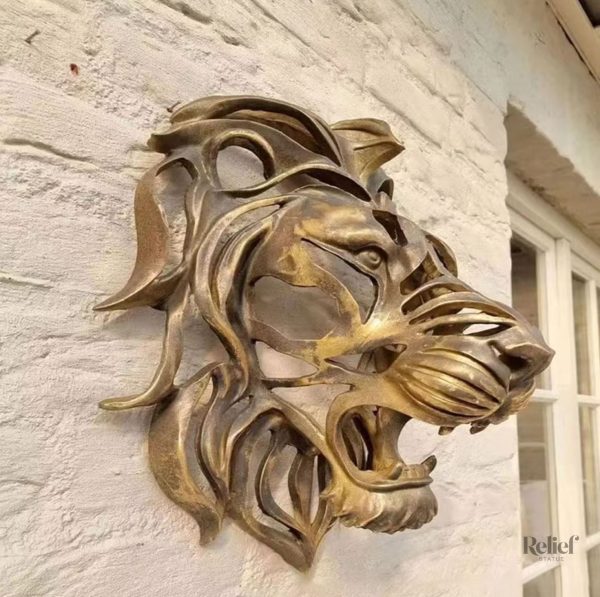 Statue lion dorée 30 cm pour un décor élégant