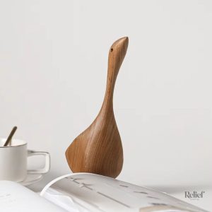 Sculpture oie en bois, style nordique, design épuré