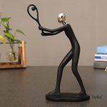 Sculpture d'un homme dédié au sport
