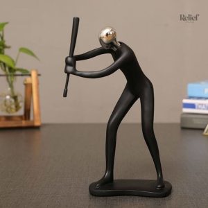 Sculpture d'un homme pratiquant un sport