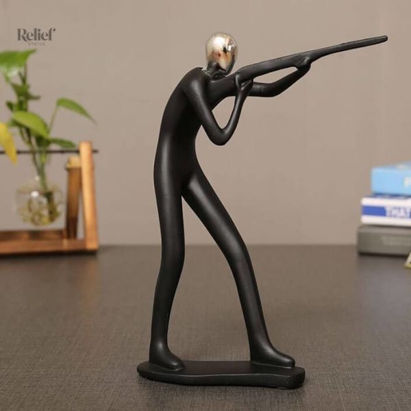 Homme en posture de compétition sculpté
