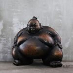Statue d'un lutteur sumo, héritage culturel japonais