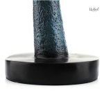 Art décoratif : statue de femme pensive dorée